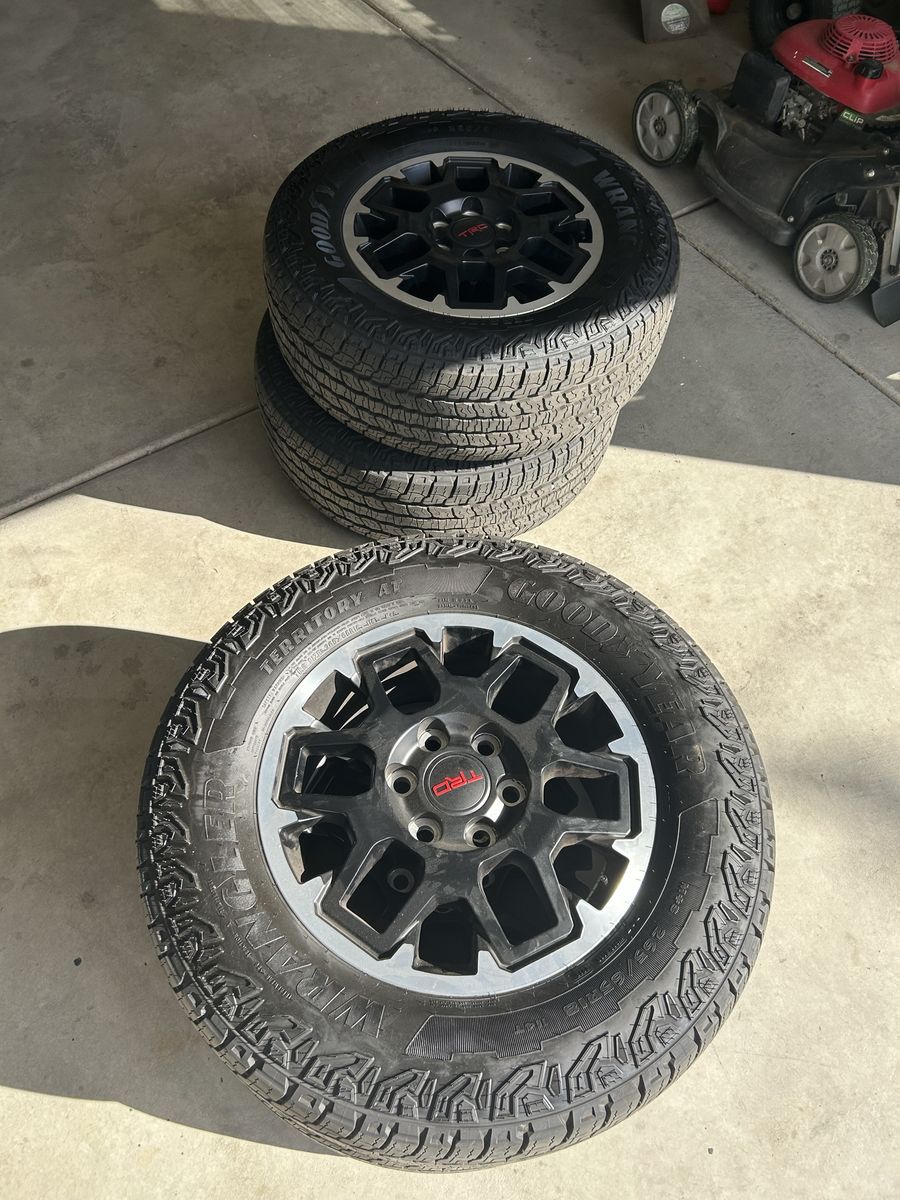 Goodyear Wrangler Territory AT 265/65R18 Tires w/ TRD Wheels Set of 4)