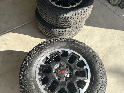 Goodyear Wrangler Territory AT 265/65R18 Tires w/ TRD Wheels Set of 4)