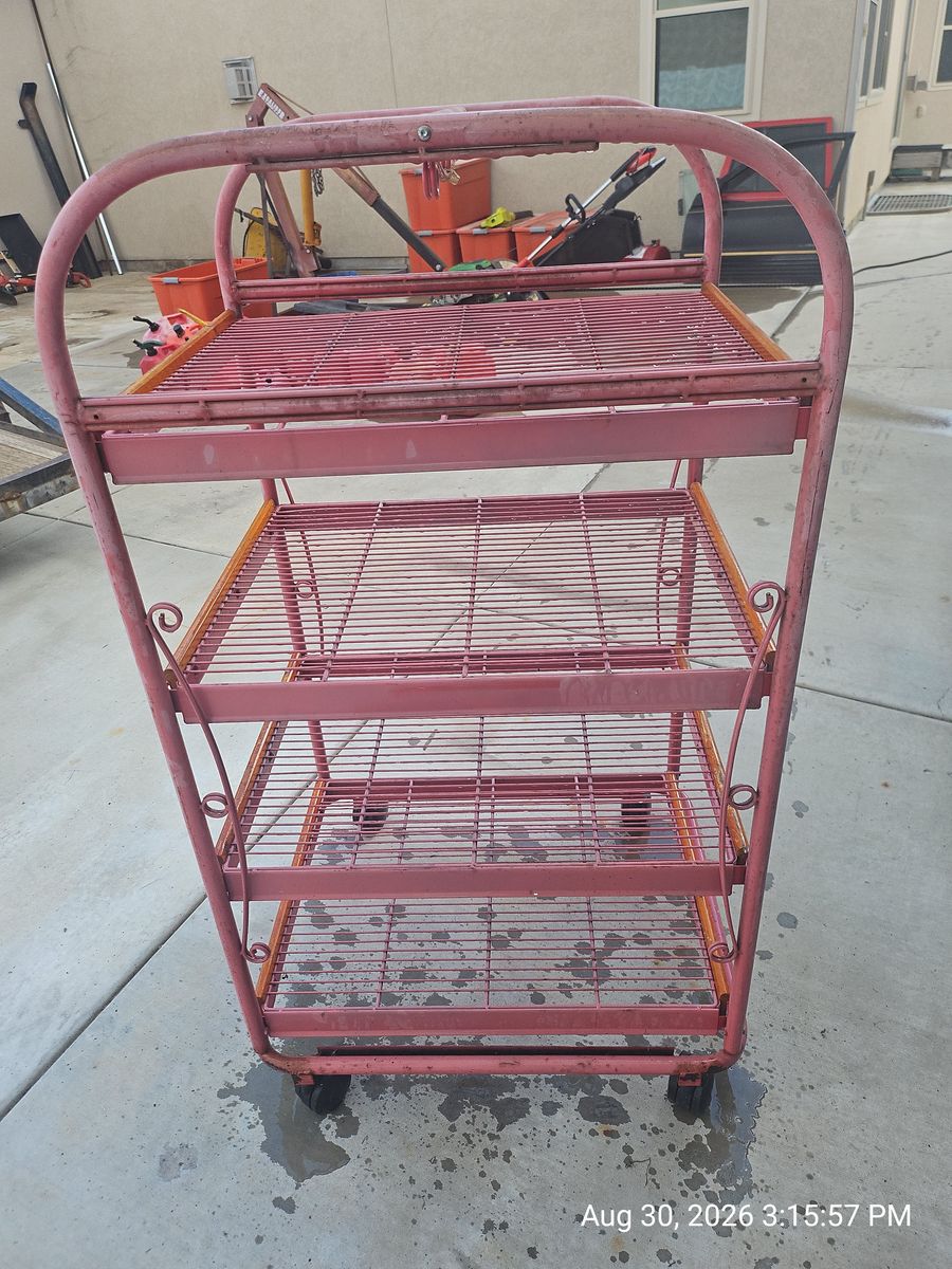 Vintage Pink Rolling Wire Bakers Rack with Four Shelves and Casters