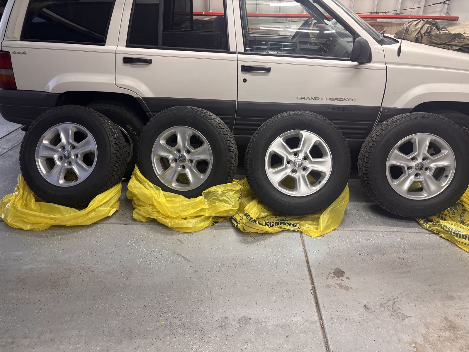 I4 jeep grand Cherokee stock rims and winter tires