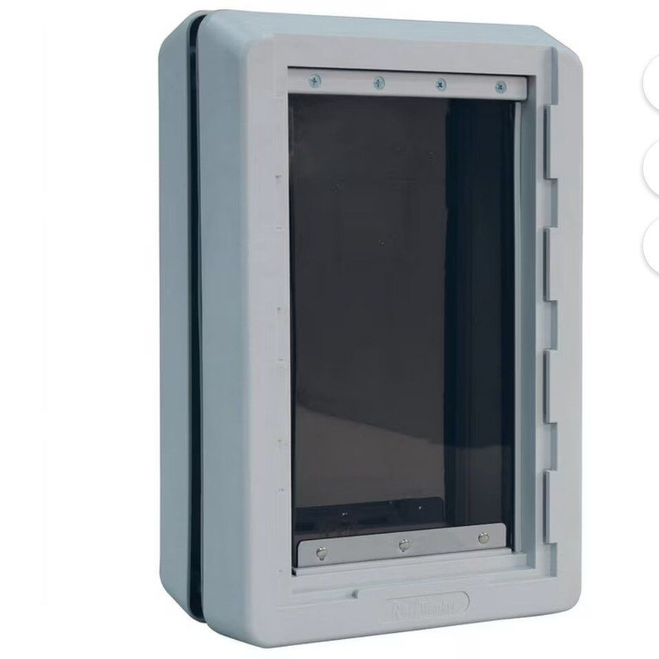 Excellent condition ideal Ruff Weather pet door.