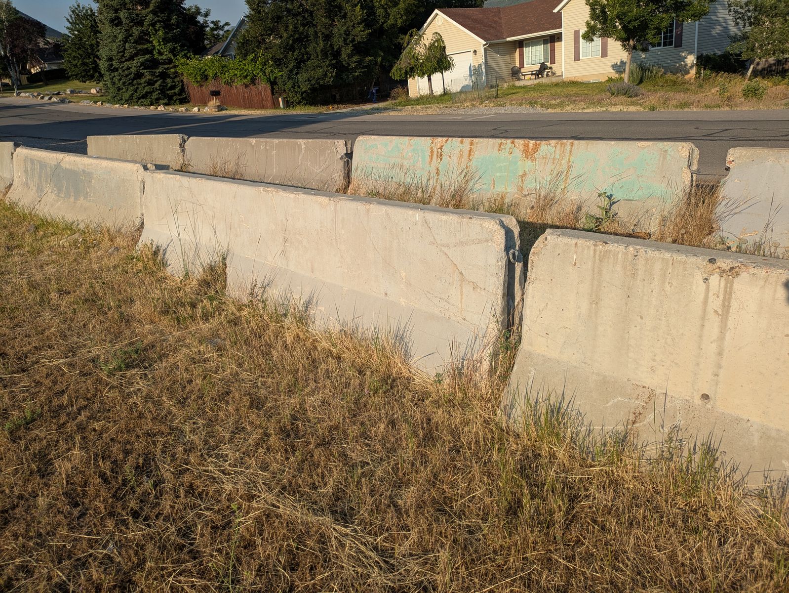 Fifteen 12.5-foot concrete Jersey Barriers - FREE