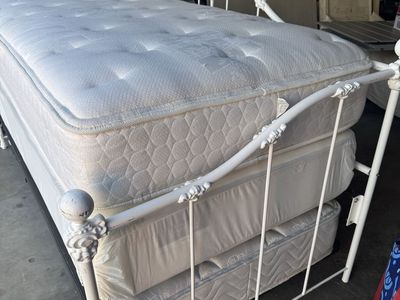 Twin size bed with two mattresses