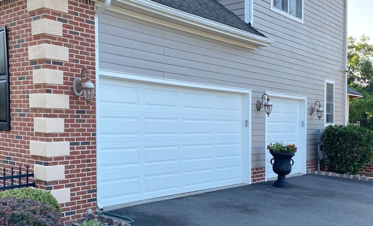 16 ft x 7 ft White Garage Door Clopay Steel Long Panel Insulated 7x16 upgraded.