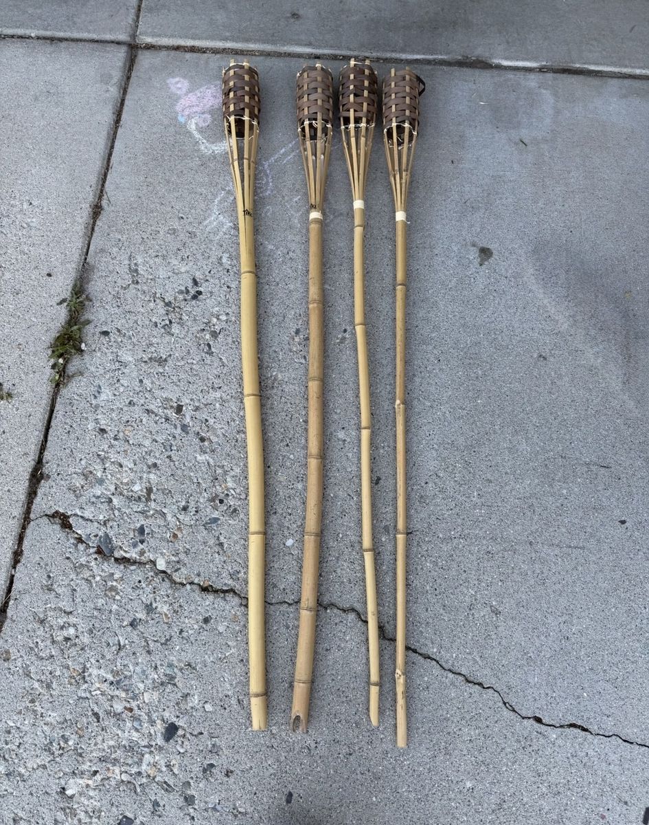 Tiki torches and bottle of fuel