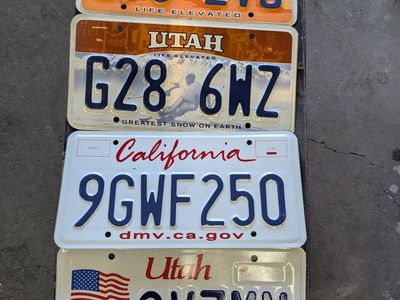 250 VARIOUS ASSORTED UTAH & CALIFORNIA LICENSE PLATES