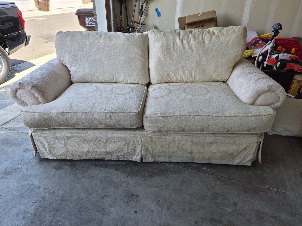 Elegant Cream Floral Pattern Loveseat and Sofa - Rolled Arms, Skirted Base -