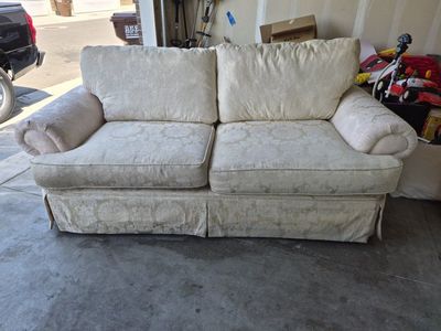Elegant Cream Floral Pattern Loveseat and Sofa - Rolled Arms, Skirted Base -