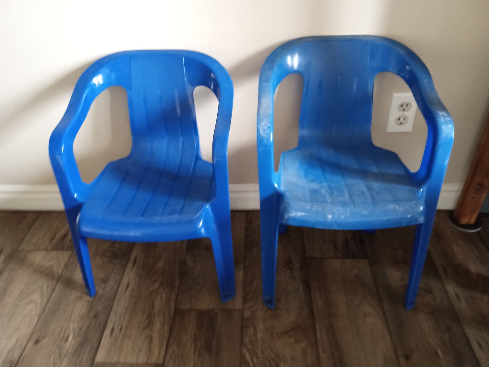 Two blue plastic children's chairs for patio outside inside camping kids chairs