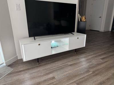 Modern White TV Stand with LED Lights – Excellent Condition – Pickup Only