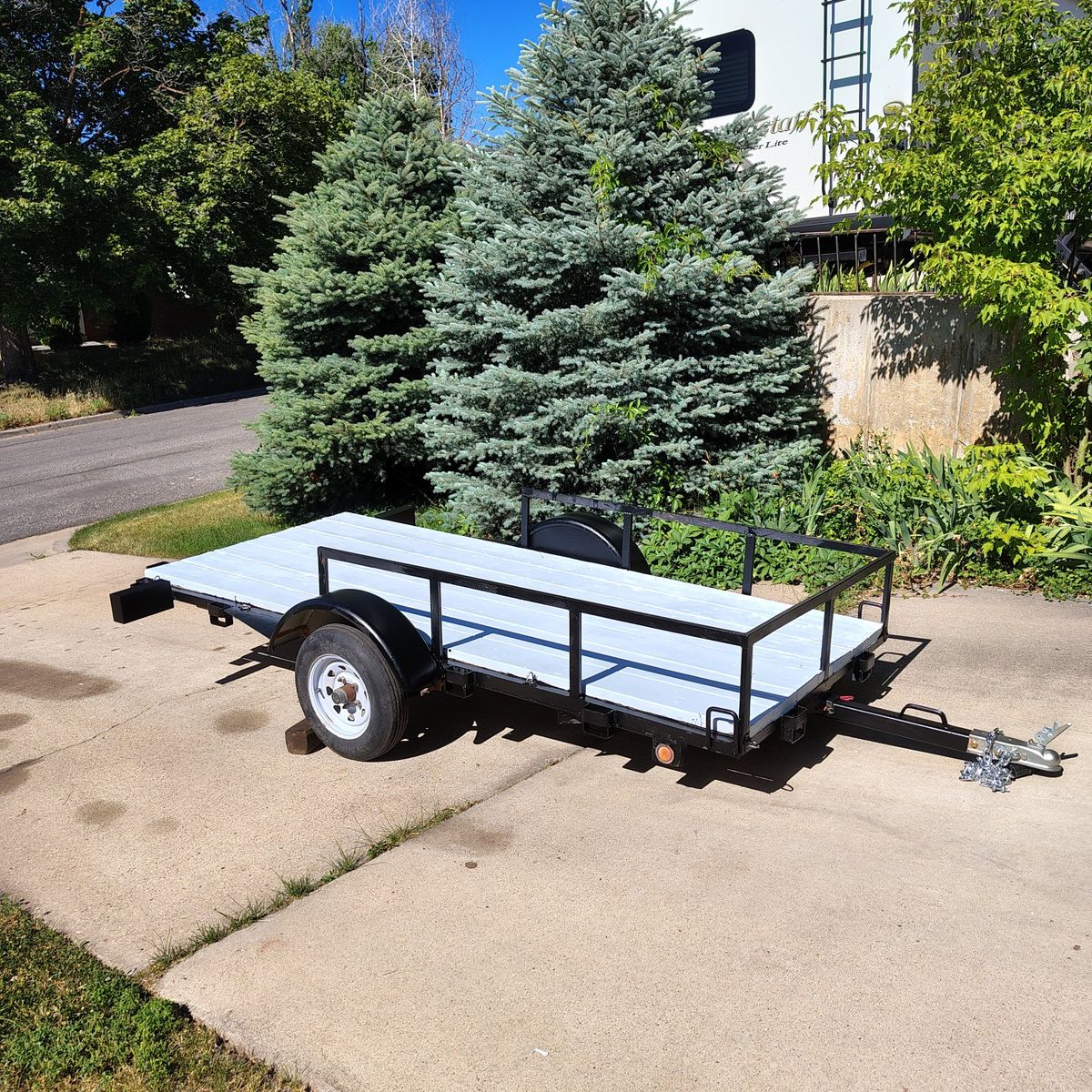 Utility Trailer - Compact and Versatile 4x10 ft Flatbed with 12" Tires