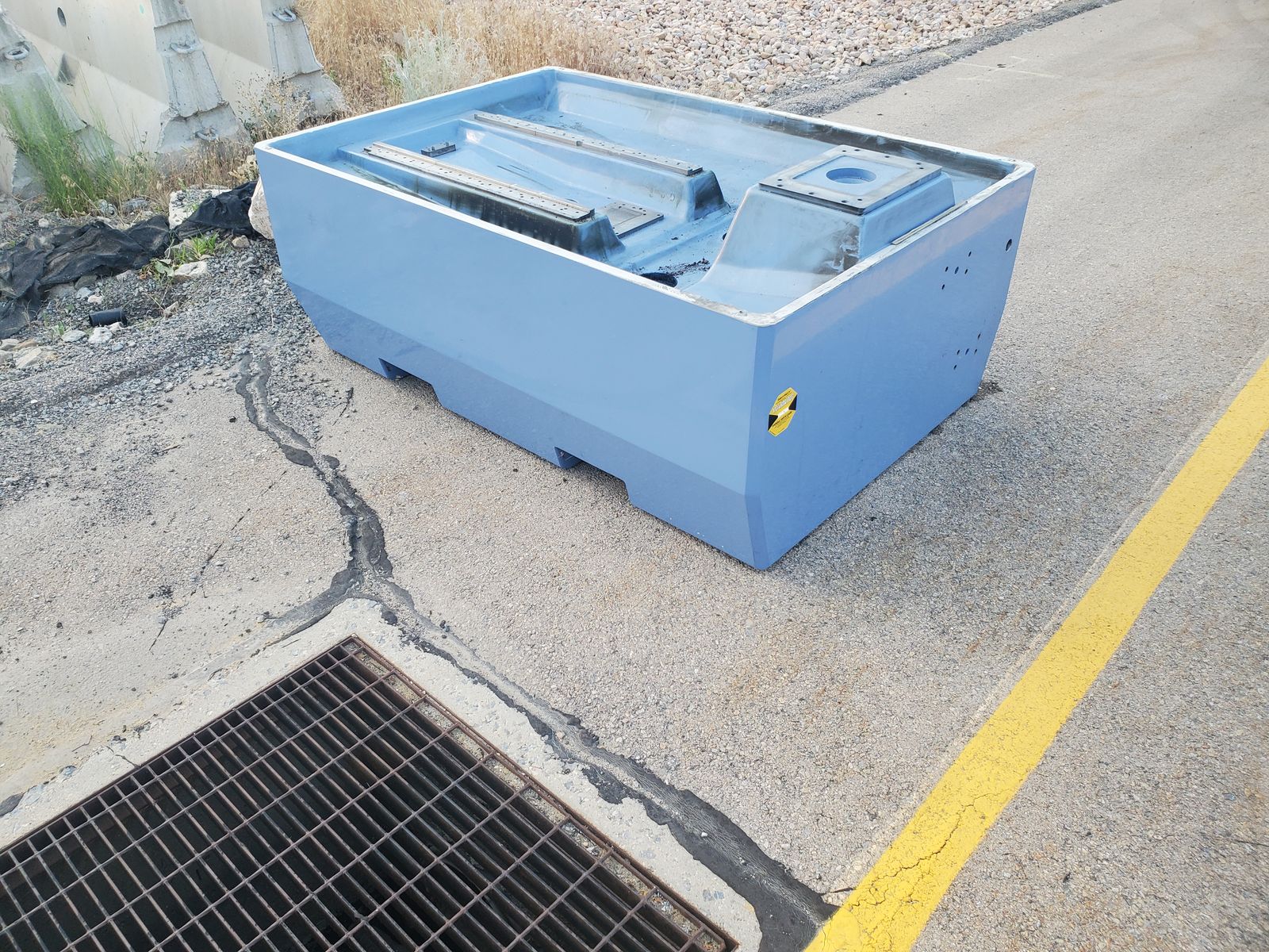 Machine base road barrier?  Paper weight?
