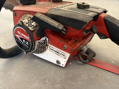 Homelite Super E-Z Automatic Chainsaw - Vintage Red Gas-Powered Chain Saw