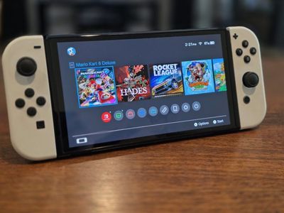 Nintendo Switch OLED Model Console Bundle with White Joy-Cons, Games & Accessories