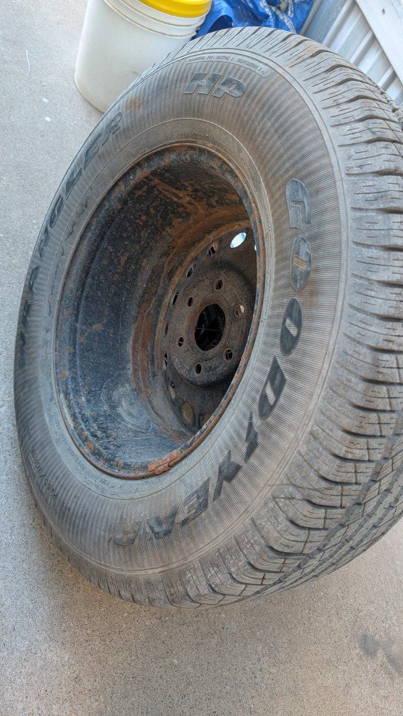 Goodyear Wrangler HP Tire & Rusty Wheel - FREE (Used, Fair Condition)