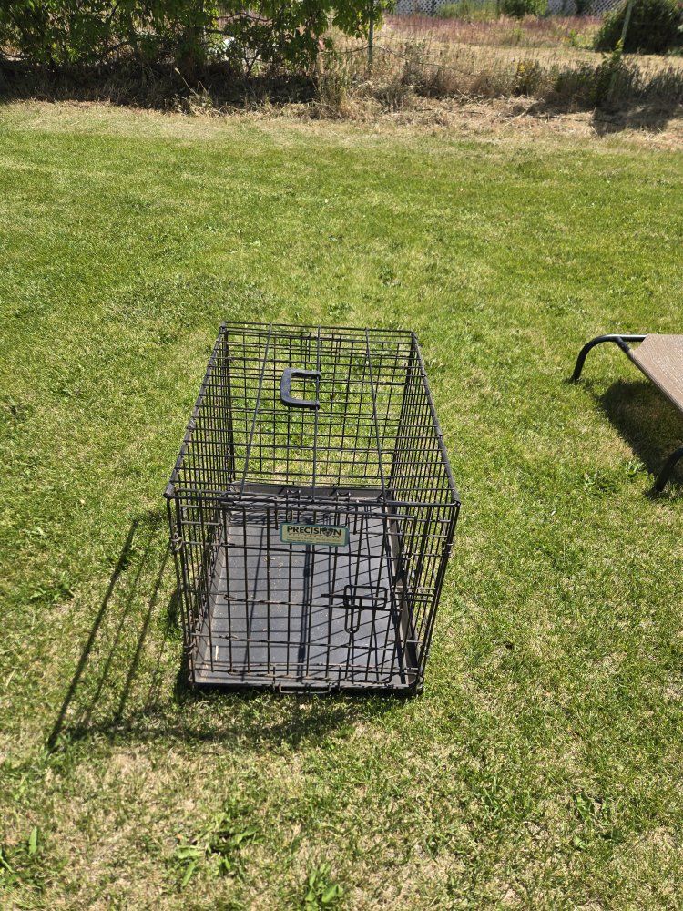 COLLAPSIBLE LARGE DOG KENNEL, USED IN GOOD SHAPE. 30.00 CASH CALL/TEXT JUSTIN 801-319-2623