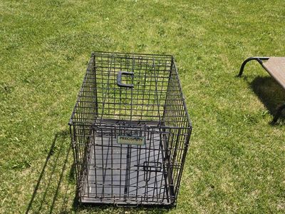 COLLAPSIBLE LARGE DOG KENNEL, USED IN GOOD SHAPE. 30.00 CASH CALL/TEXT JUSTIN 801-319-2623