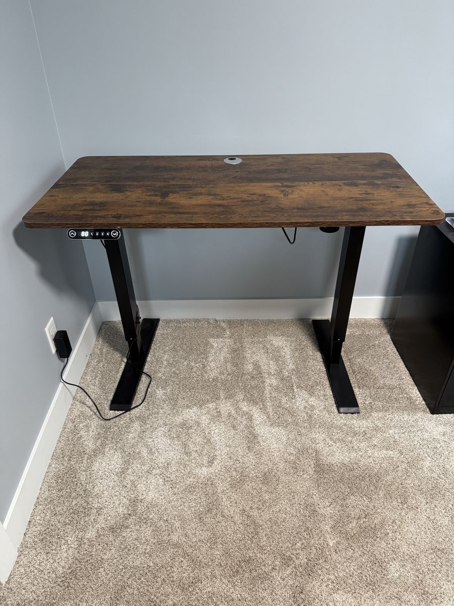 Sit to stand desk