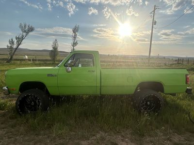 Dodge Ram 250 Green Pickup Truck 4x4 with Lift Kit and Custom Wheels
