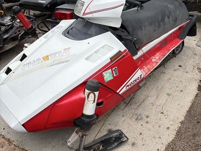 3 scrap metal snowmobiles