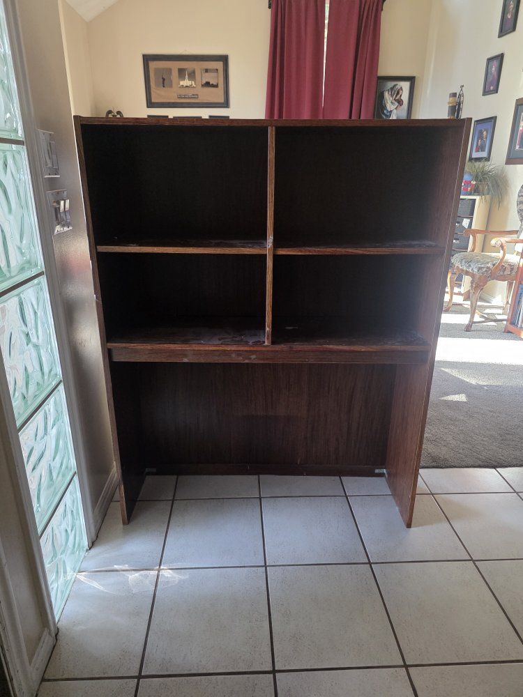 behind bed bookcase