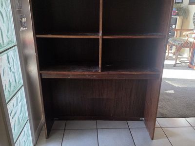 behind bed bookcase
