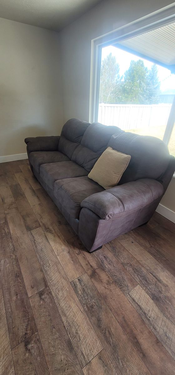 2 Gently Used Legend Brown Sofas