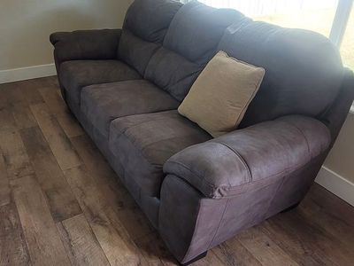 2 Gently Used Legend Brown Sofas