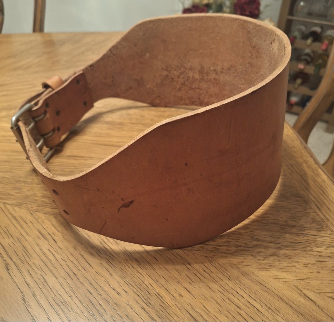 Used Leather Weightlifting Belt.  46" long and about 6.3 mm thick.