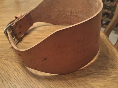 Used Leather Weightlifting Belt. 46" long and about 6.3 mm thick.