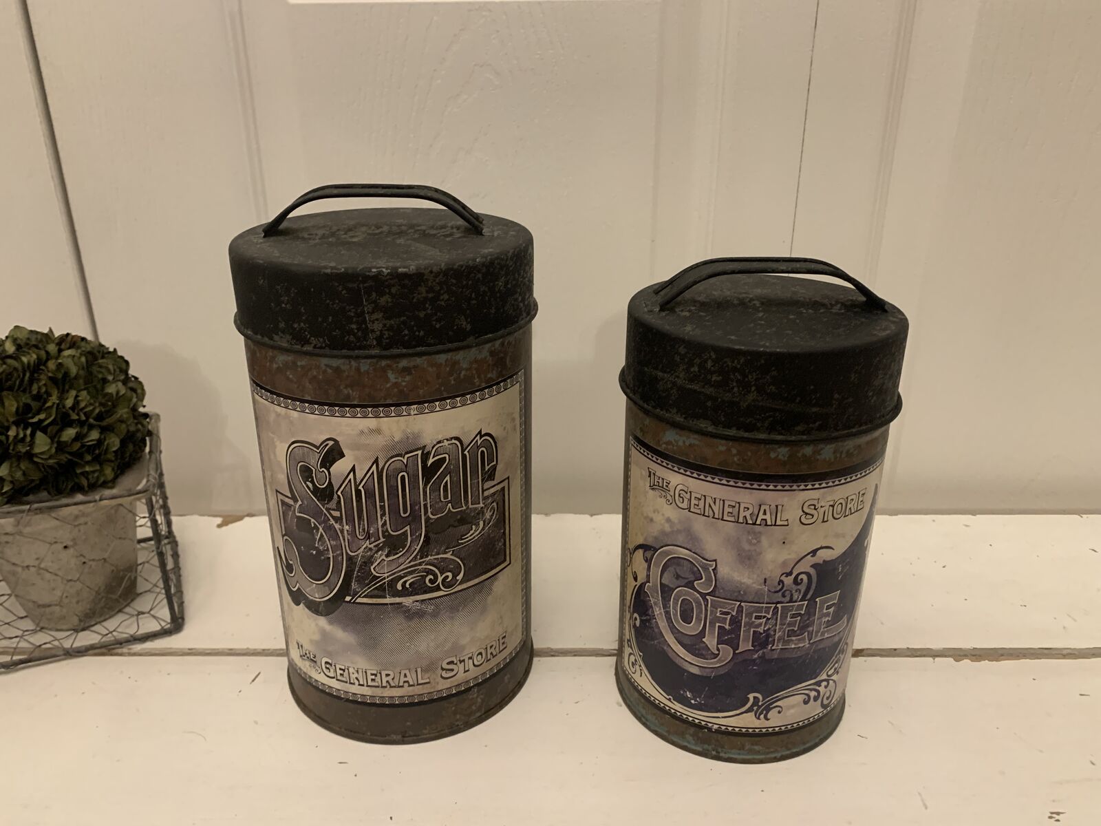 Two Metal Canisters