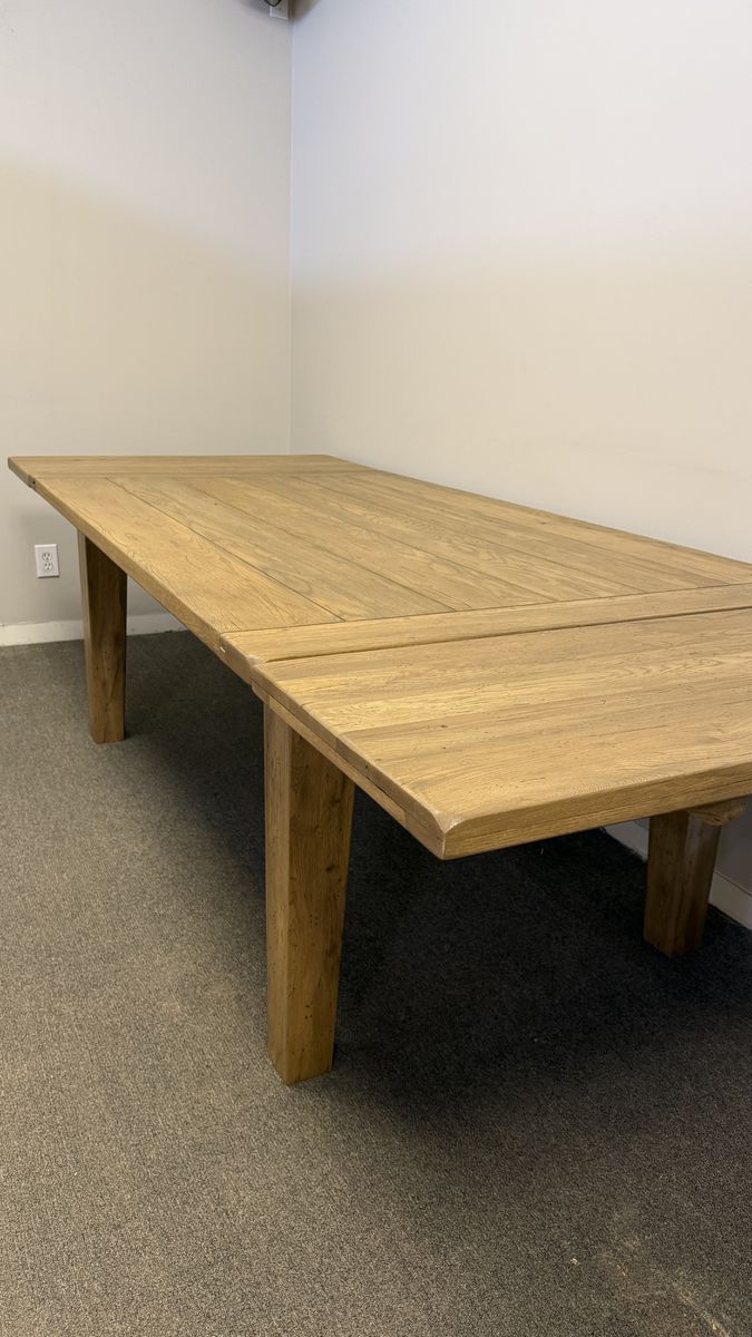 Solid wood dining table with two leaves