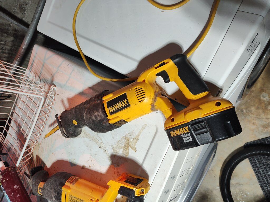 DeWalt sawzall with old style battery.