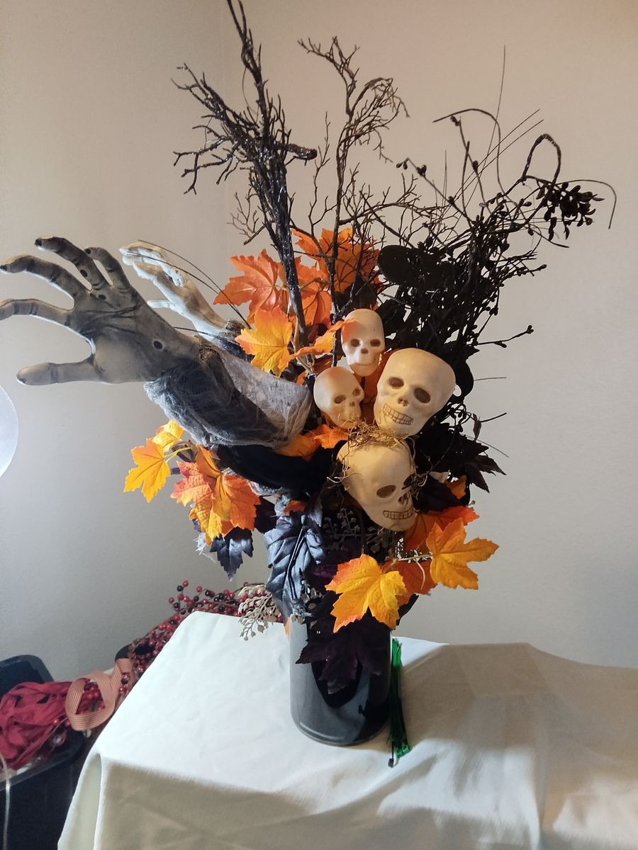 Spooky Halloween Floral Arrangement Centerpiece with Skulls and Zombie Hands
