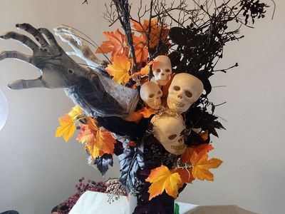 Spooky Halloween Floral Arrangement Centerpiece with Skulls and Zombie Hands