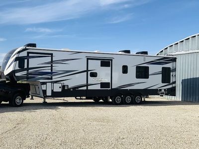 2020 Keystone Fuzion 419 Toy Hauler Fifth Wheel RV - 15' Garage, Triple Slide, Bath & Half