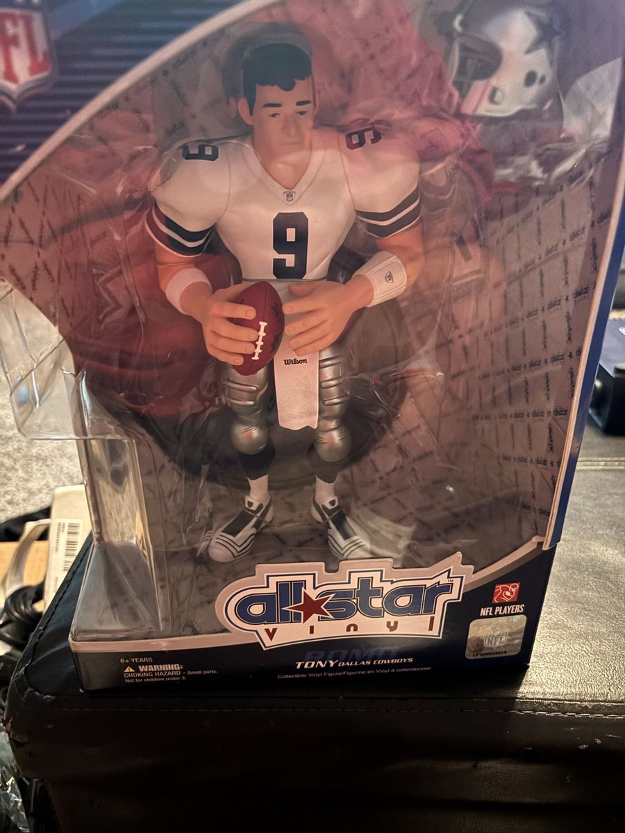 Brand new Tony Romo action figure in box