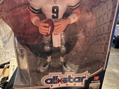 Brand new Tony Romo action figure in box