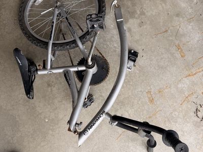 Tag-along bike attachment