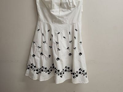 ladies size 16 runs smaller white dress, has some flaws NWT