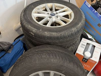 Ford OEM Silver 15-inch Wheels & Tires (Set of 4)