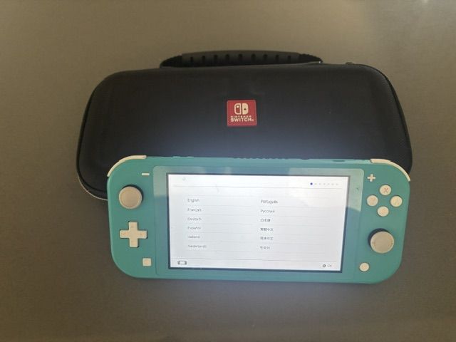 Nintendo Switch Lite Turquose & Nintendo Carrying Case