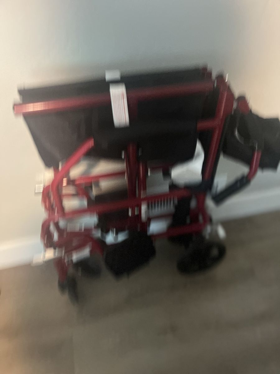 Light weight, foldable wheelchair, with footpedals, like New. Located in Holladay
