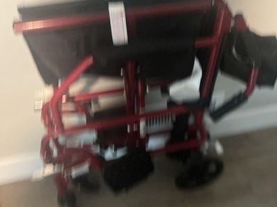 Light weight, foldable wheelchair, with footpedals, like New. Located in Holladay