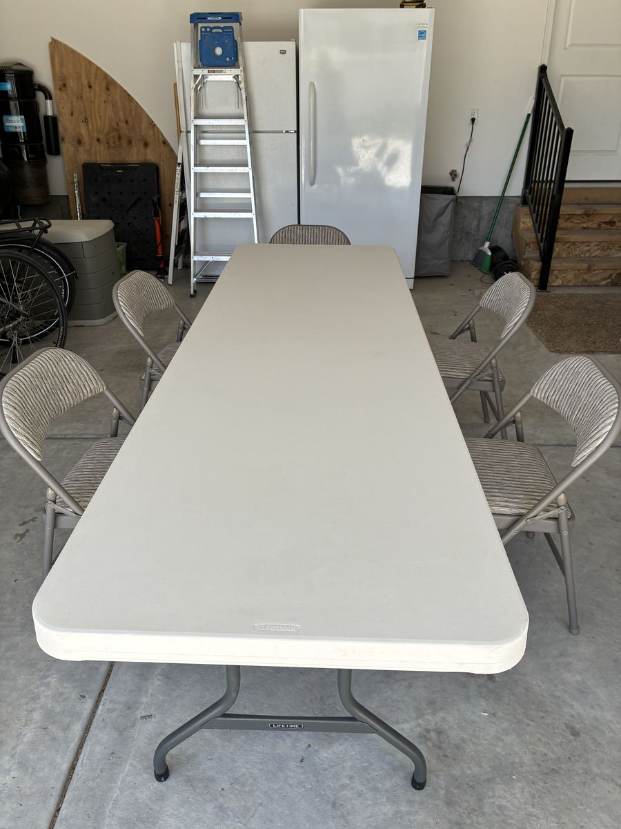 1 Lifetime table + 5 padded folding chairs