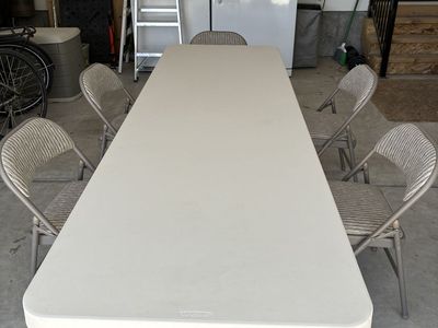 1 Lifetime table + 5 padded folding chairs