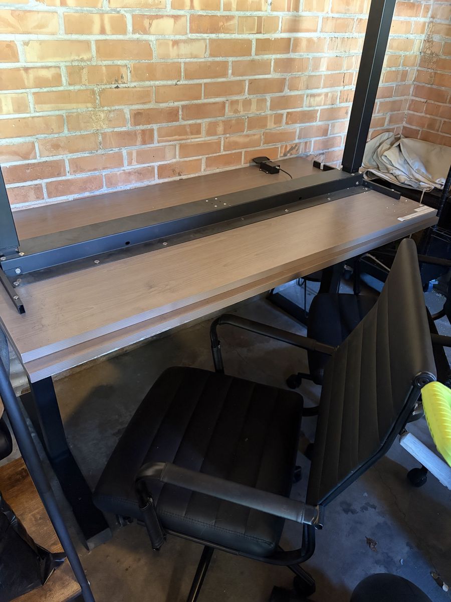 2 chairs and 2 adjustable standing desks