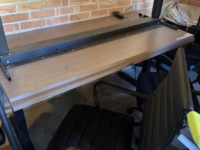 2 chairs and 2 adjustable standing desks