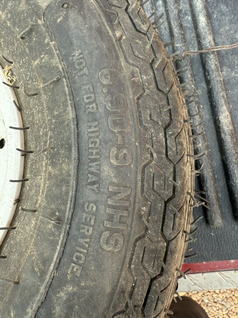 New Carlisle 6.90-9 Tire And Wheel