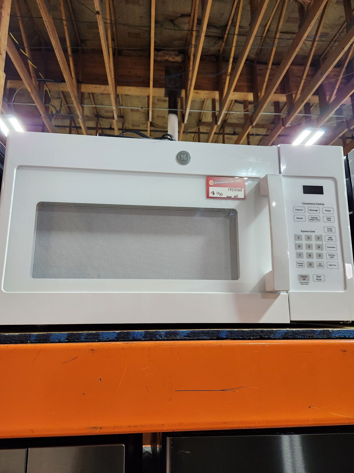 NICE GE WHITE OVER THE RANGE MICROWAVE! W-WARRANTY